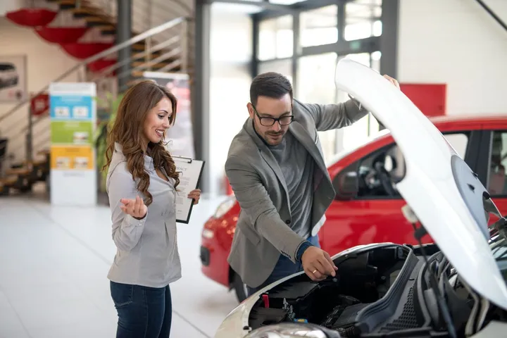 Car dealer presenting a vehicle in Wrentham, MA